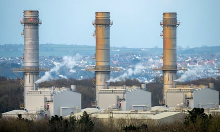 A modern power station with three very large identical chimneys