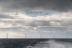 FILE - The five turbines of America's first offshore wind farm, owned by the Danish company, Orsted, are seen from a tour boat off the coast of Block Island, R.I., Oct. 17, 2022. On Friday, Sept. 27, 2024,  Gov. Tina Kotek called on the Bureau of Ocean Energy Management to halt plans to auction offshore leases to develop floating offshore wind off the Southern Oregon coast.