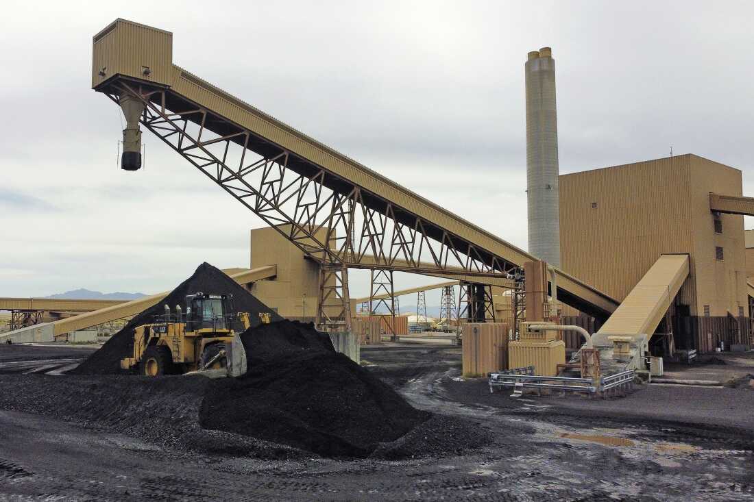 Piles of coal wait to be burned at Intermountain Power Plant near Delta, Utah, in 2022.