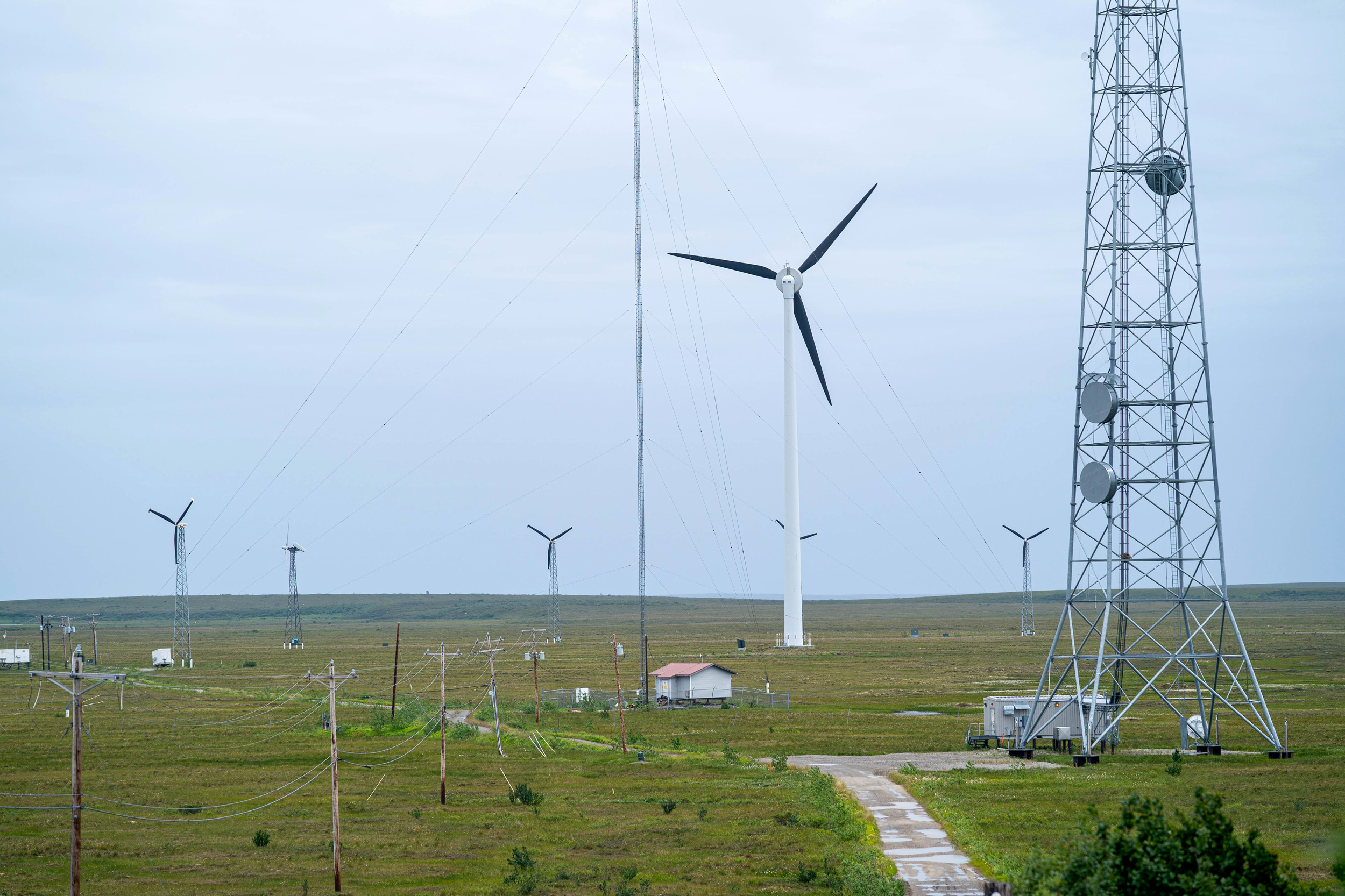 Many rural communities in Alaska have long relied on diesel fuel for power generation. That's an expensive option that has helped to spur the development of renewable power alternatives such as these wind turbines near Kotzebue Alaska. Credit: Loren Holmes/ADN