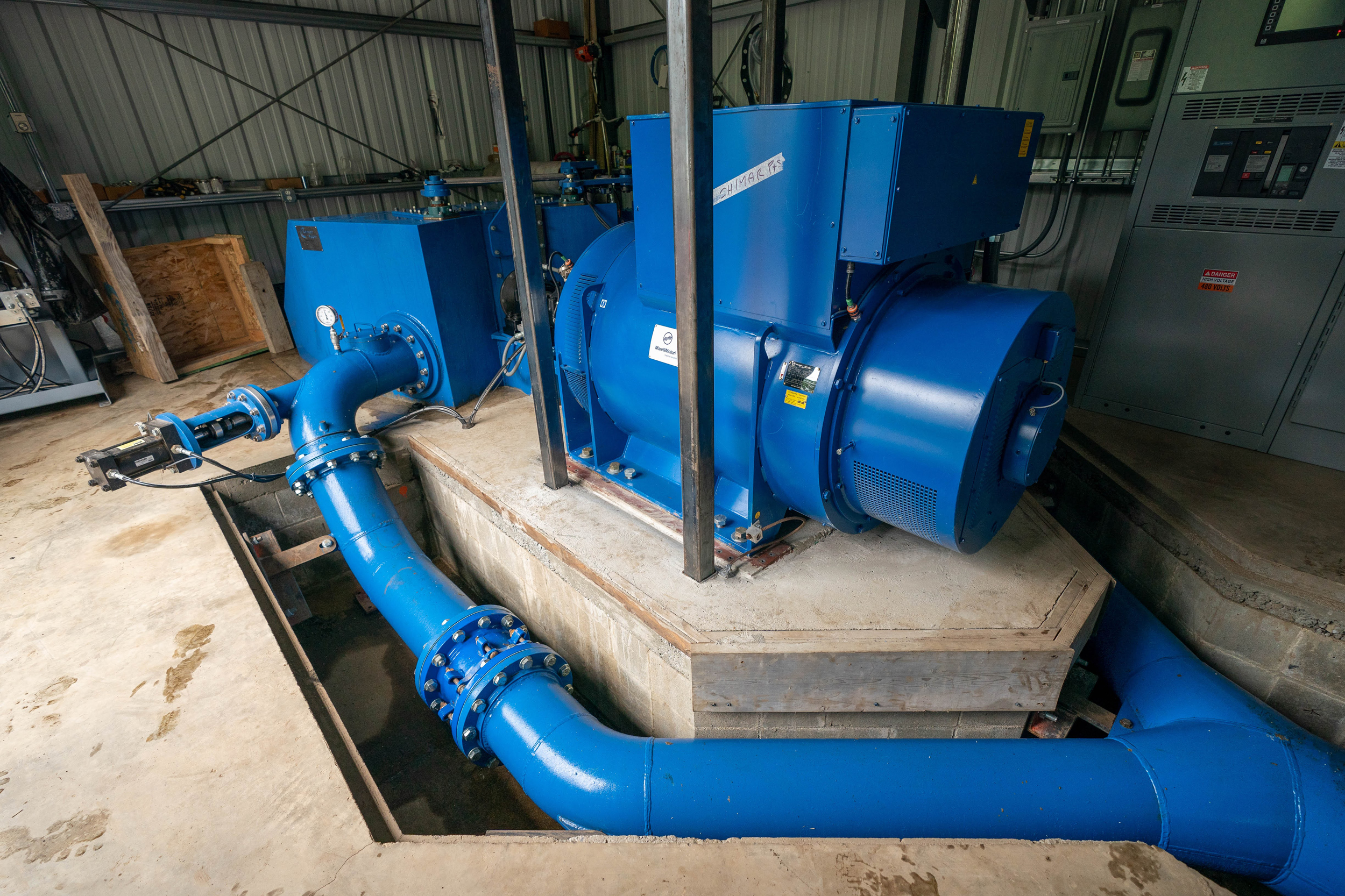 For Alaska, small-scale hydro projects that divert power from mountain creeks can help to green the grid. In the Juniper Creek project near Anchorage, water diverted from a stream goes through this generator. Credit: Loren Holmes/ADN