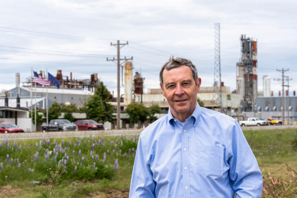 David Clarke stands outside the shuttered Agrium fertilizer plant on July 1 in Nikiski. The Agrium plant once produced hydrogen from natural gas as part of the process to make fertilizer. Credit: Loren Holmes/ADN