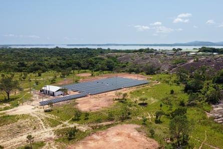 Solar panels in a green landscape