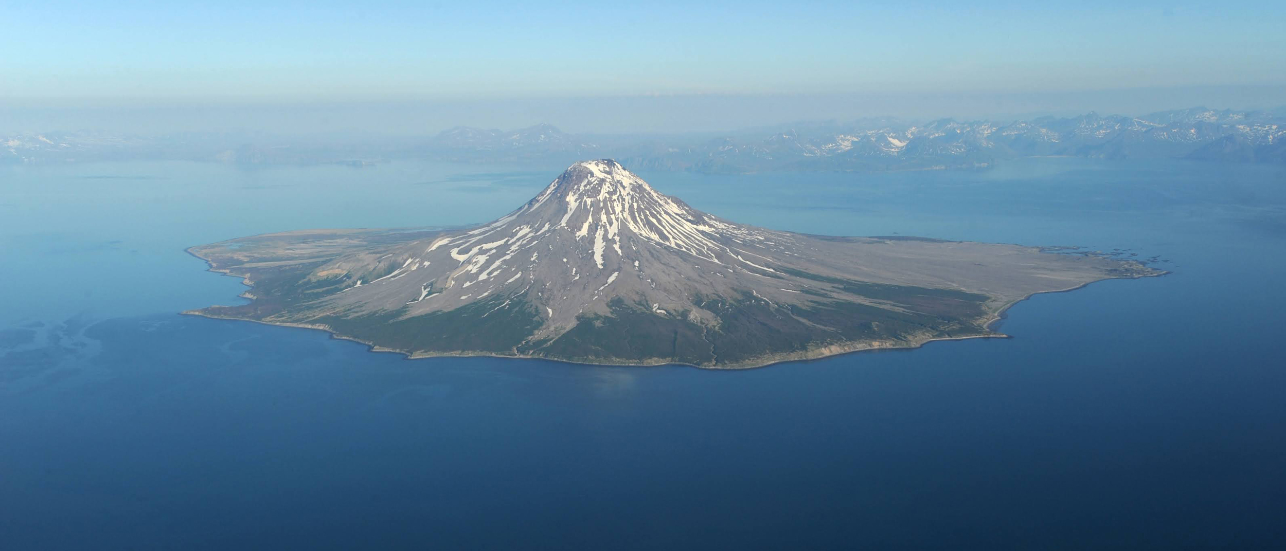 For the past two summers, GeoAlaska has financed crews who have gathered data about the geothermal potential of Augustine Volcano on an island in the Cook Inlet. Credit: Anne Raup/ADN