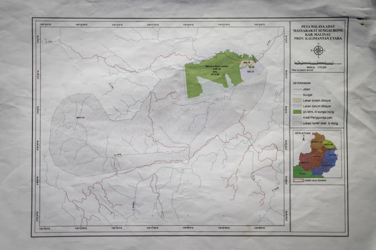 A photo of a map of PT Malinau Hijau Lestari's concession, which local residents shared with Mongabay. Image by Nanang Sujana for Mongabay.