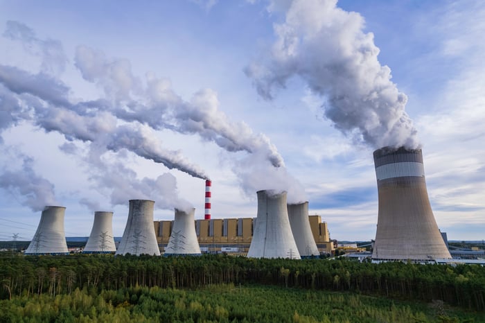 Cooling towers of a nuclear power plant emitting water vapor.