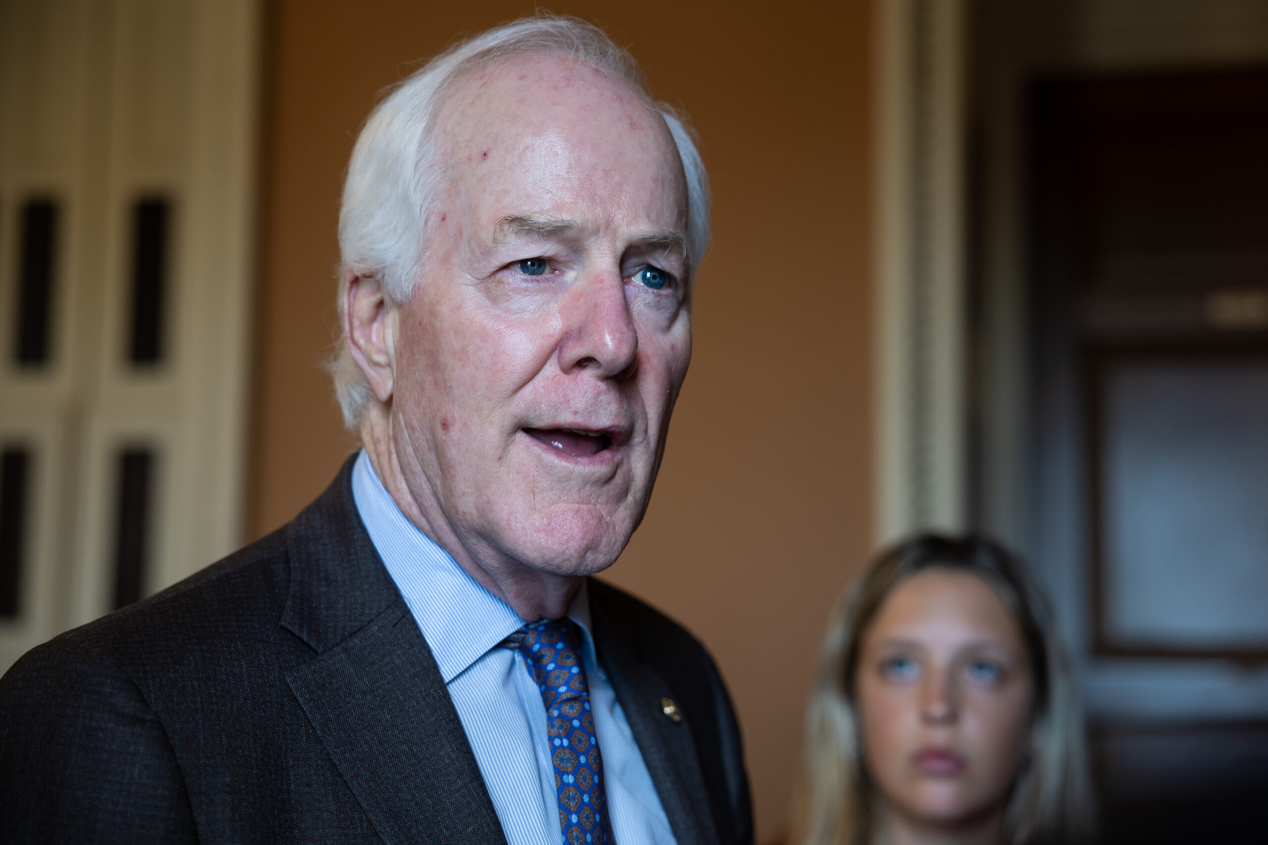 Sen. John Cornyn (R-Texas) speaks with reporters at the U.S. Capitol.