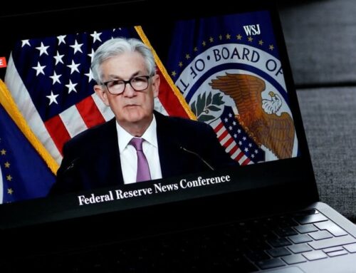 Bitcoin Rises as Fed Holds Rates Steady