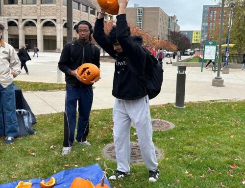 Students smash pumpkins to help environment and relieve stress
