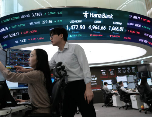 Bitcoin falls 9% and Asian shares slip after Wall Street is hit by tech stock losses