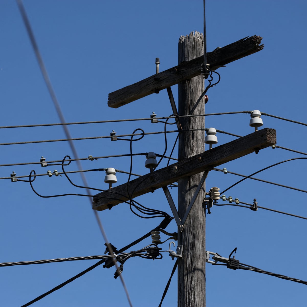 Power bills on Australia’s east coast expected to fall by up to 10% from July bringing ‘welcome relief’