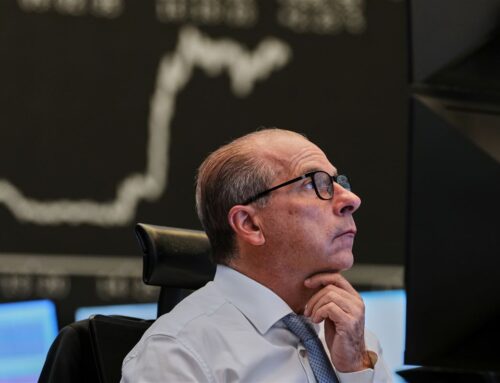 Oil prices jump and stocks are mixed as the U.S.-Iran standoff keeps the Strait of Hormuz