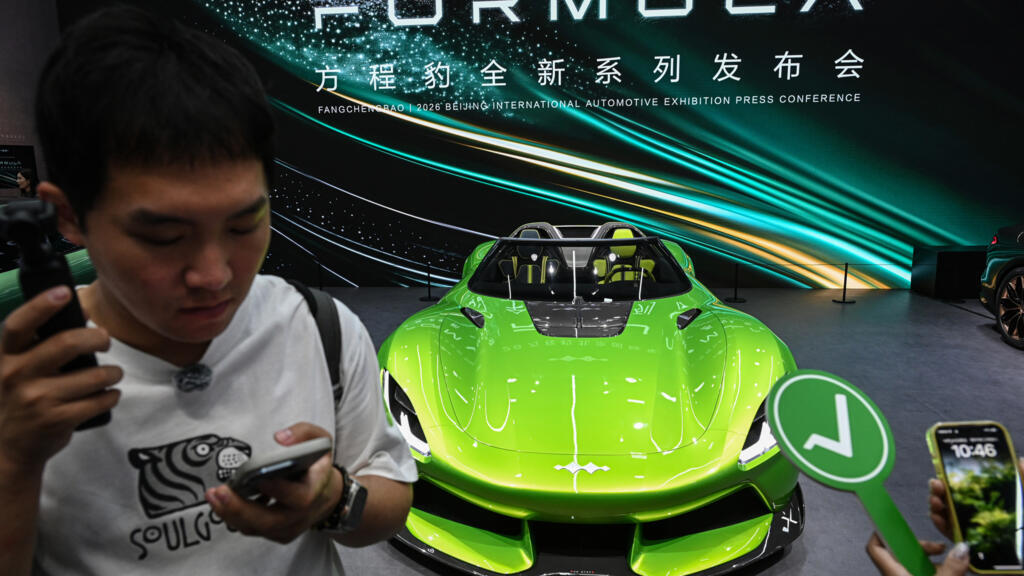 China Showcases Electric Vehicles And Flying Cars At Major Auto Expo