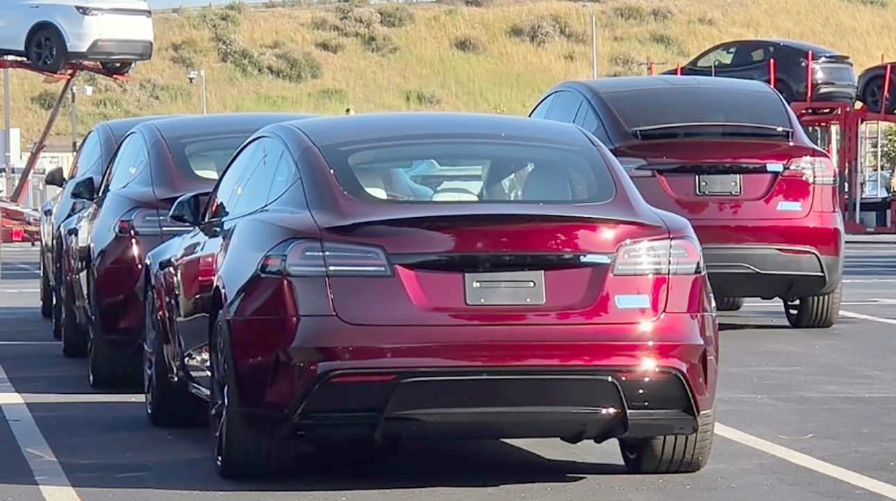 Tesla Model S and X Signature in Garnet Red spotted at the Fremont factory ahead of the delivery event