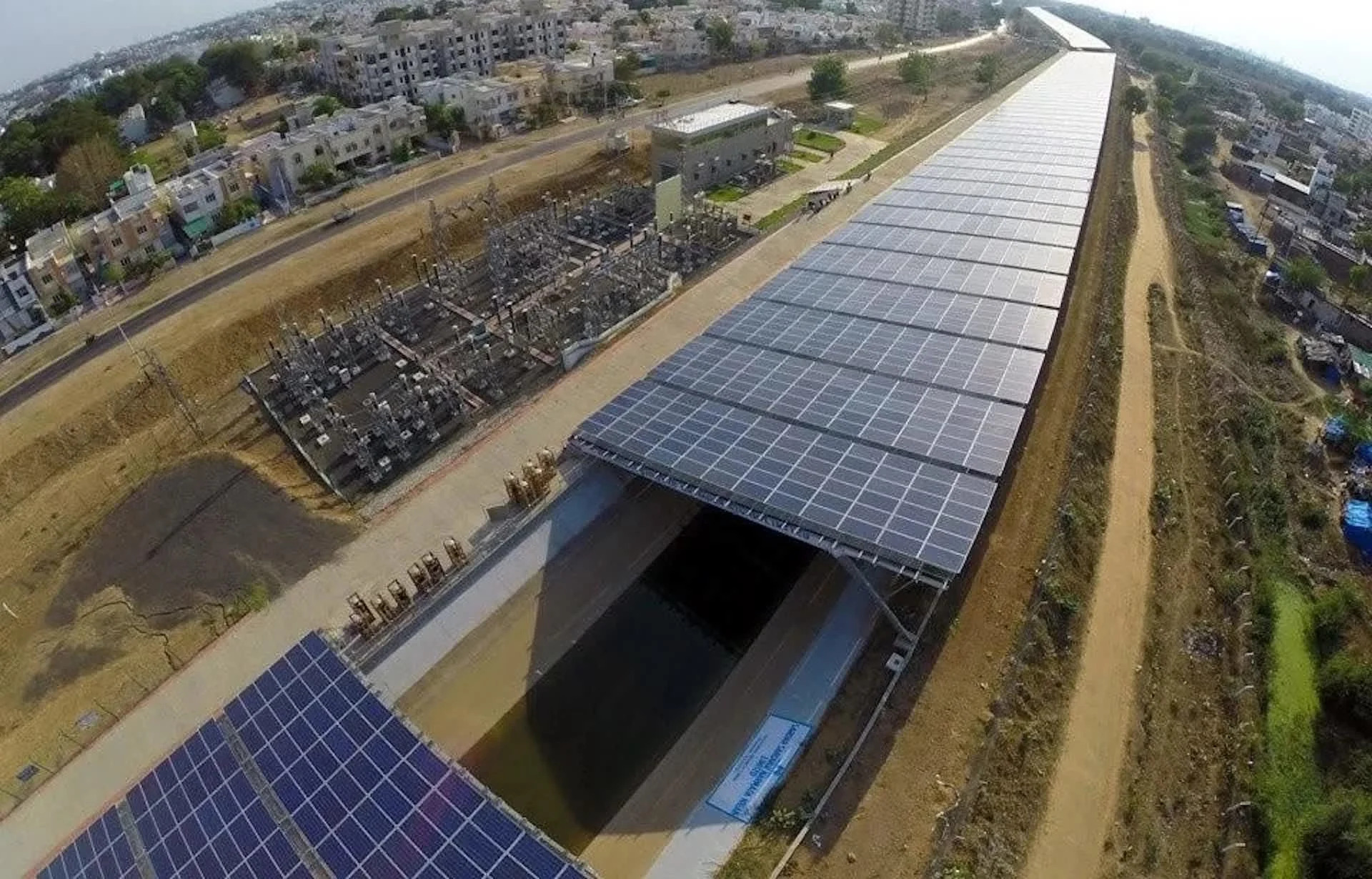 Solar panels built over an irrigation canal are winning praise for producing power while cutting evaporation