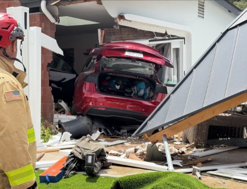 Tesla smashes through fence into Clairemont home