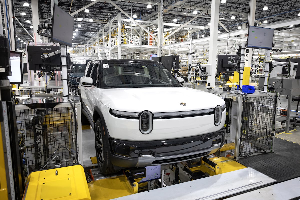 Rivian cuts hundreds of jobs days after launching new EV model Rivian cuts hundreds of jobs days after launching new EV model